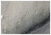 Sinus Meridiani and Meridiani Planum Stratigraphy