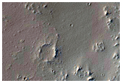 Fractures in Noctis Fossae Transitioning to Plains Material