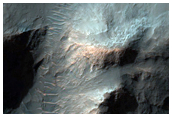 Channel Wall Collapse in Ladon Valles