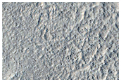 Material Contrast in Northern Plains