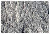 Layers around Low Mounds in Nilosyrtis Mensae
