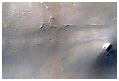 En brant sluttning i Ius Chasma