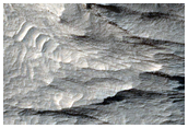 Light-Toned Stratified Materials in Eastern Candor Chasma