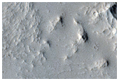 Trough and Ridges along Crater Slope