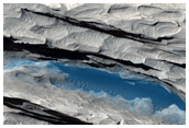 Dark Sediments in the Medusae Fossae Formation