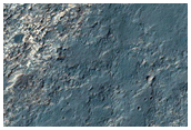 Light-Toned Mesa-Forming Materials in Terrain Cut by Samara Valles
