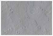 Elevated Structures South of Ascraeus Mons