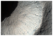 Well-Preserved Small Crater in Syria Planum
