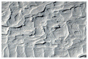 Distal Alluvial Fan Slopes and Sand in the Medusae Fossae Formation