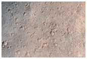 Olivine-Rich Bedrock on Crater Wall in Promethei Terra