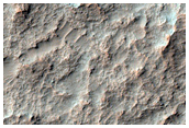 Straight Ridges in Middle of Crater Floor in Iapygia Region
