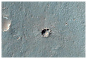 Intersection of Craters along Rim of Vinogradov Crater