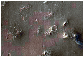 Light-Toned Layered Material in Northwest Schiaparelli Crater