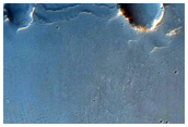 Dark Deposit in Crater Near Mawrth Vallis