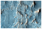 Possible Quartz-Rich Terrain in Antoniadi Crater