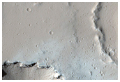 Chain of Pit Craters Near Ceraunius Tholus