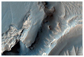 Eroded Ejecta Layers in Unnamed Crater in Arabia Terra