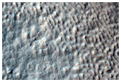 Troughs and Mounds in Crater Near Reull Vallis