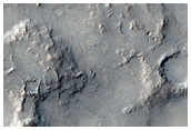 Possible Preserved Impact Melt Flow on Ejecta of Bakhuysen Crater