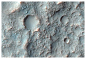 Basin and Channel Features in Terra Sirenum Intercrater Terrain