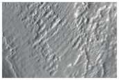 Possible Layered Deposit in Open Basin