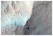 Excellent Bedrock Exposures in Crater on North Rim of Hellas Basin