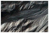 Gullies Incising Mantle-Filled Alcove in Eastern Argyre Region