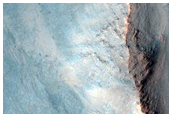 Monitoring Slopes in Ius Chasma