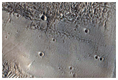 Flows and Valleys in Northern Lycus Sulci Terrain
