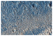 Mantled Mounds in Erebus Montes