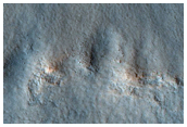 Pedestal Crater in Northern Plains