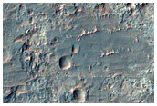Light-Toned Deposits in Northern Ladon Valles Basin