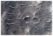 Landform Transition from Chaos Terrain to Outflow Channel