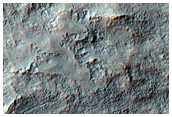 Small Crater with Possible Gullies in Terra Sirenum