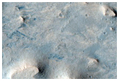 Transition from Flow to Light-Toned Material West of Meridiani Planum
