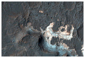 Light-Toned Phyllosilicates along the Floor of Ladon Valles Basin