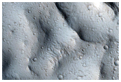 Valleys Cut across Northern Lycus Sulci