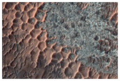 Monitor Slope Features in Central Pit of Elorza Crater