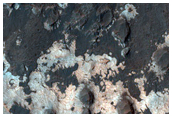Light-Toned Rock Outcrops in MOC Image R09-00101 North of Sigli Crater