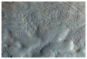 Crater on Floor of Coprates Chasma