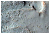 Valleys and Fans in Crater in Terra Cimmeria