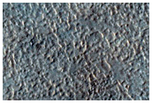 Small Channel within Larger Valley in Hellas Region
