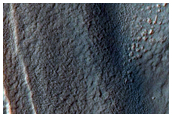 Layered Material West of Hellas Planitia