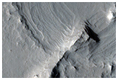 Layers in Crater Beneath Ridge in CTX Image