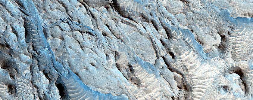 Small Channels and a Rocky Patch in the Cydonia Region