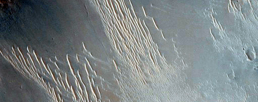 Small Flat-Floored Valley System in Madler Crater