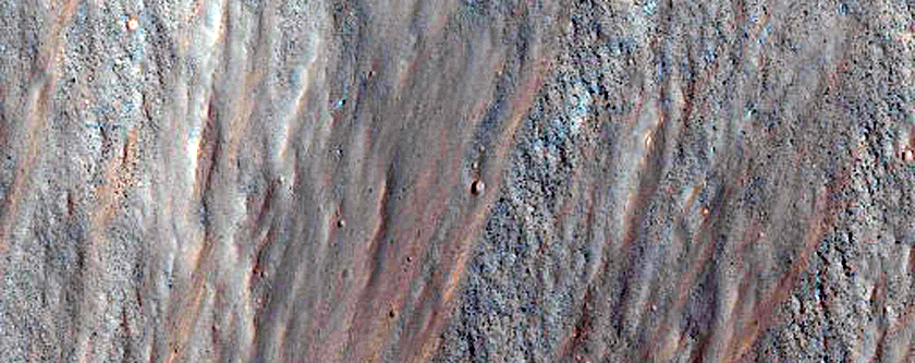 Disrupted Crater Near Ophir Chasma