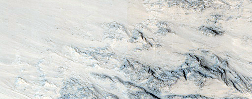 Massifs and Layers in a Sirenum Fossae Trough