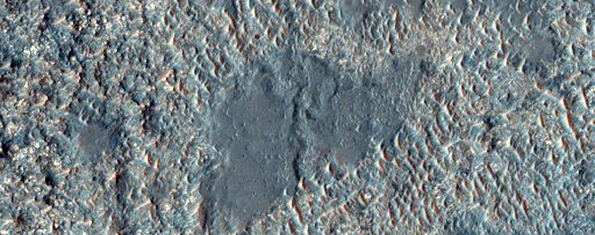 Light-Toned Surface with Parallel Ridges in Crater Interior