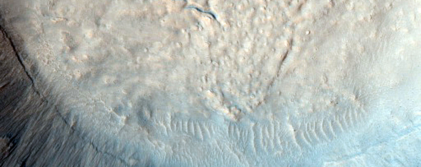 Relationship of Curvilinear Channel and Crater Ejecta